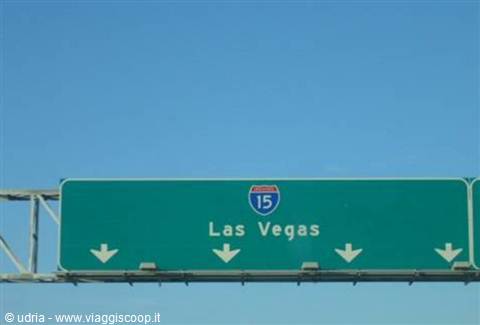 Green highway sign toward Las Vegas, Interstate 15, clear blue sky