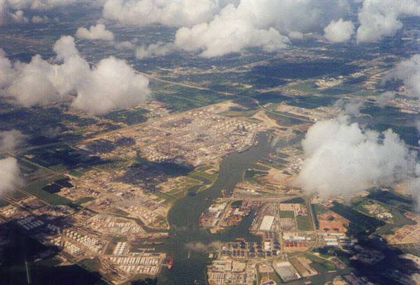 From the plane, industrial port with refineries and ships along Houston ship channel
