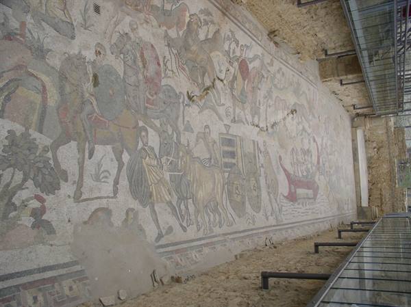 Roman mosaic frieze with horsemen and animals at Villa Romana del Casale