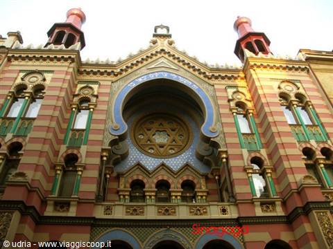 Jerusalem Synagogue in Prague, colorful striped facade with rose window and Star of David