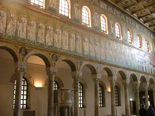 Byzantine mosaic of saints above the arcades of Sant'Apollinare Nuovo basilica in Ravenna