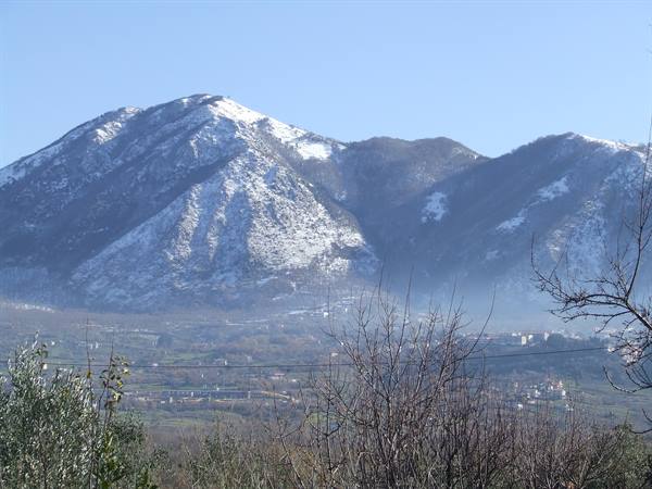 MONTELLA - Snowy mountain dominates the village of Bagnoli Irpino