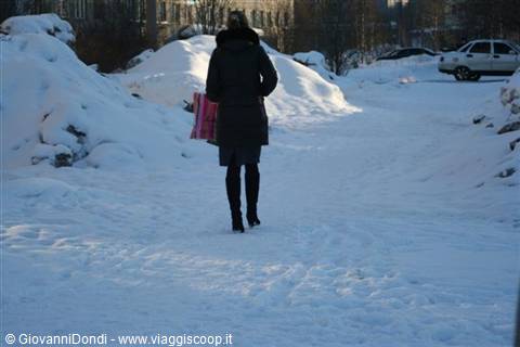 they move on high heels among piles of snow