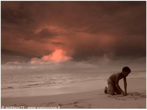 Las Terrenas beach with a child playing