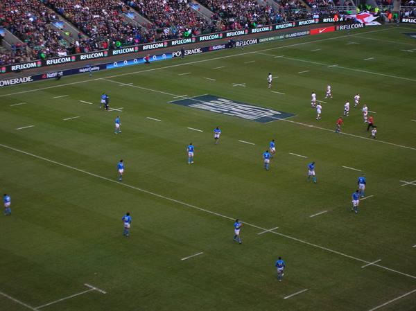 Rugby match at Twickenham stadium, stands packed with spectators