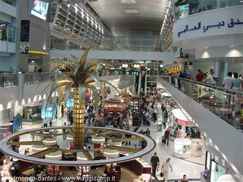 Dubai airport with the golden-leaf palm