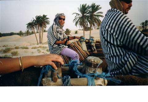 Camel ride in the desert