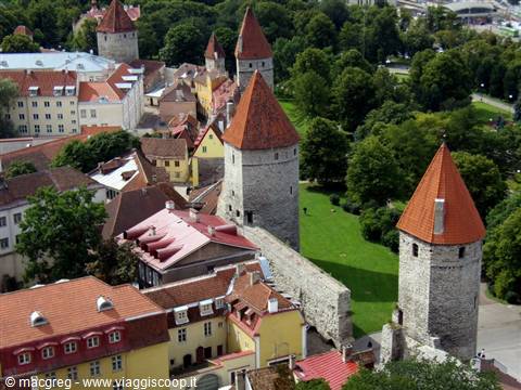 Medieval towers with red roofs along Tallinn's old town walls