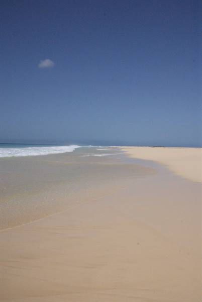 Golden sand and foamy waves on the Jandía beach in Fuerteventura