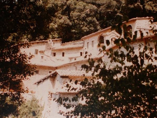 Eremo delle Carceri near Assisi, old stone hermitage among the trees