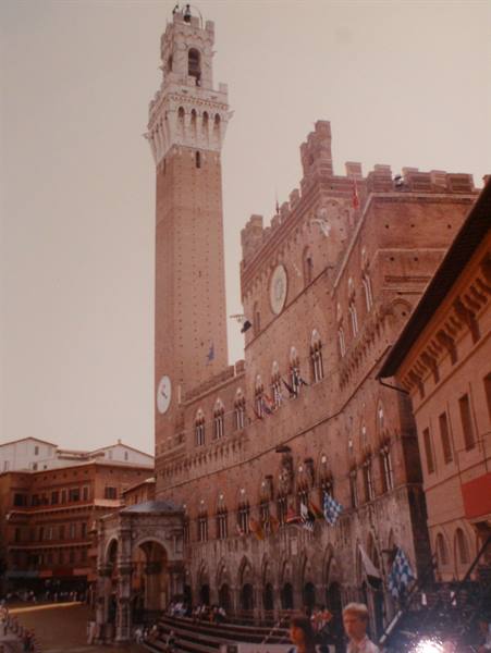 Torre del Mangia and brick Palazzo Pubblico on Piazza del Campo, Siena