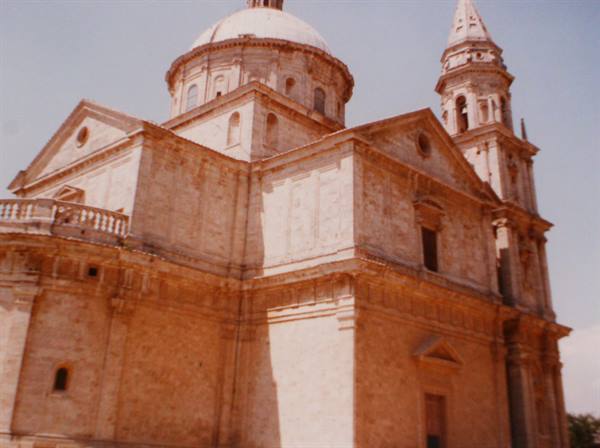 Church of San Biagio in Montepulciano, light stone facade with dome and bell tower