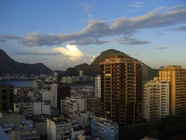 Brown towers among mountains and the bay in Rio de Janeiro