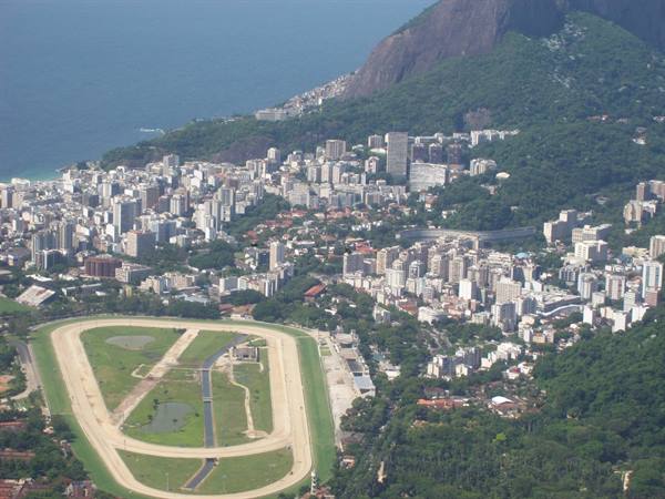 Horse racing track of Gávea among buildings and green peaks in Rio de Janeiro