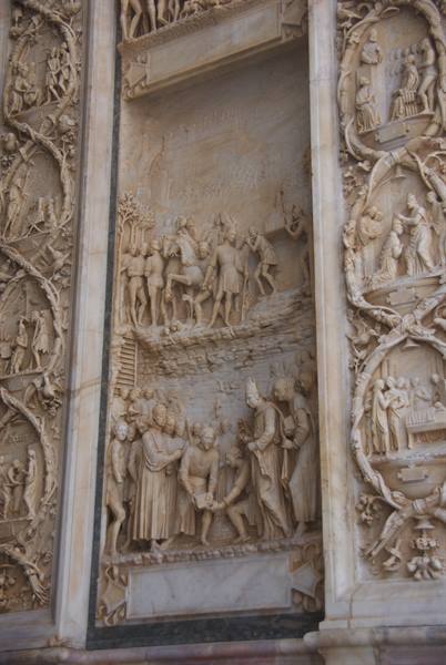Marble bas-reliefs on the facade of San Petronio in Bologna