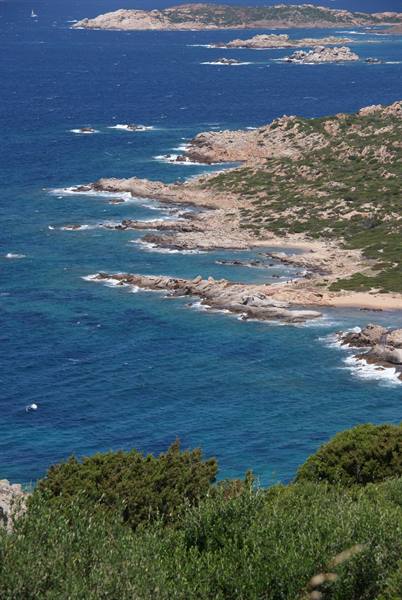 Pink granite rocks and Mediterranean scrub along the Maddalena archipelago