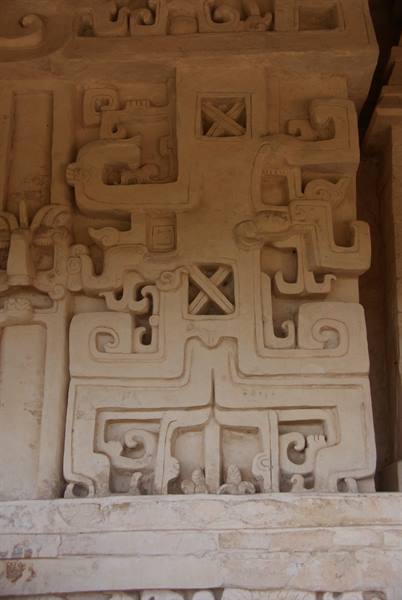 Carved adobe facade with Maya geometric motifs, Eco Museo El Meco