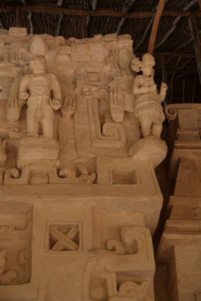 Carved stucco figures on Maya facade at Ek Balam, natural light
