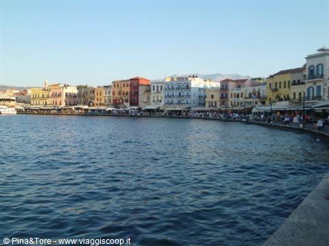 The Venetian harbour of Chania with colorful houses facing the water