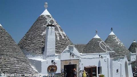 Trulli houses in Alberobello, whitewashed stone cones with painted symbols