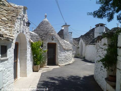 Trulli houses in Alberobello, white limestone walls and dry-stone conical roofs