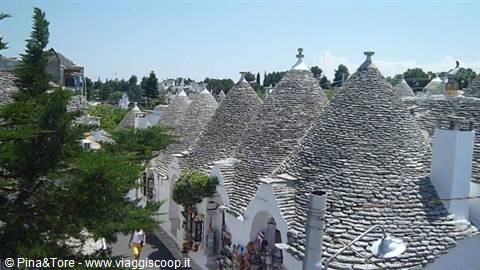 Trulli of Alberobello, limestone conical roofs shining in sunlight