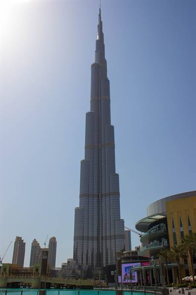 The glass and steel Burj Khalifa pierces Dubai's sky, blinding sun
