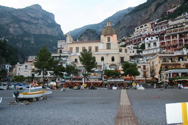 Positano: boat on the beach in front of Santa Maria Assunta church