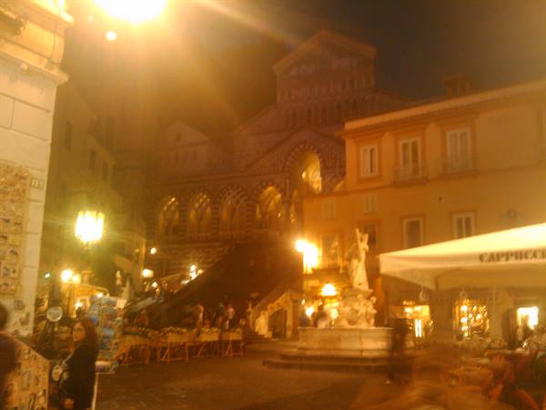 At night, Amalfi Cathedral staircase and St Andrew's fountain lit by lamps
