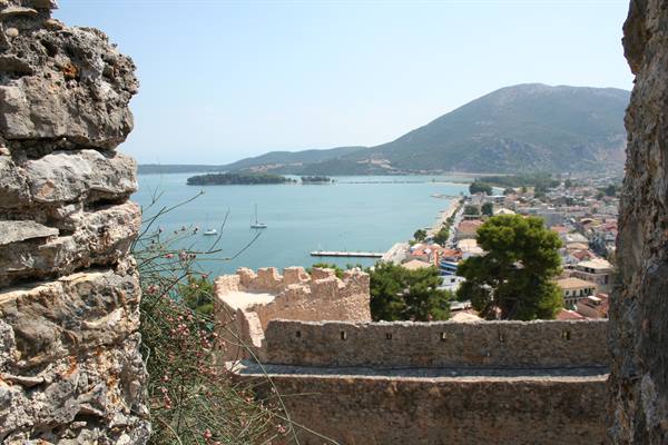 Stone fortress walls of Palamidi overlooking Nafplio town and harbor