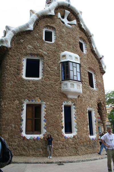 Tourists in front of Gaudí's curving stone house at Parc Güell, Barcelona