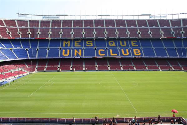 Camp Nou stadium with Més que un Club spelled out in red and blue seats
