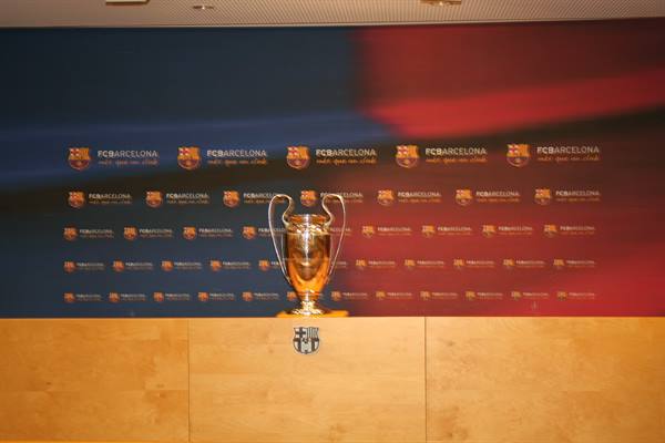 Champions League silver trophy on the press room desk at Camp Nou