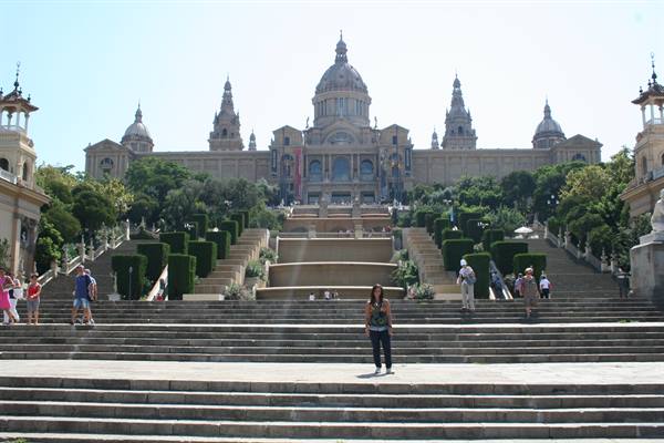 Woman on Montjuïc steps in front of the Palau Nacional, Barcelona