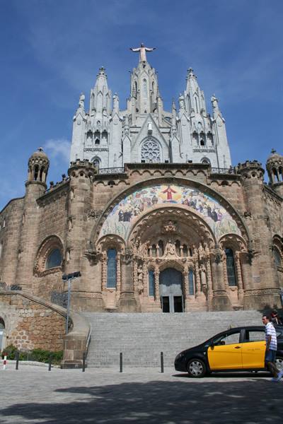 Sagrat Cor church on Tibidabo, Barcelona, stone and mosaics under a blue sky