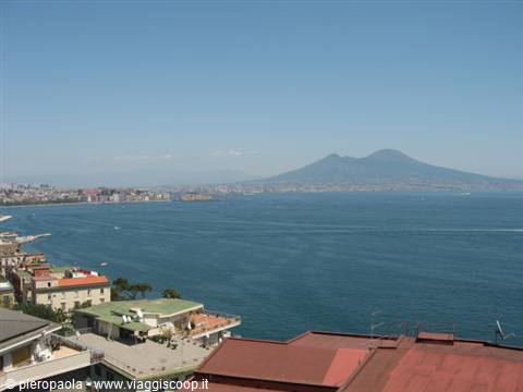 The Bay of Naples with Mount Vesuvius on the horizon and rooftops