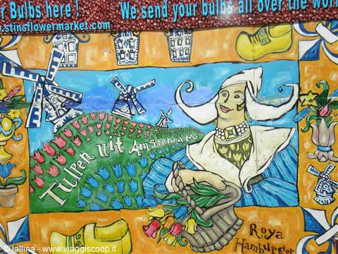 Painted mural with tulips, windmills and a woman with basket at flower market