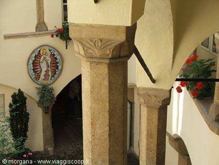 The coat of arms inside the courtyard