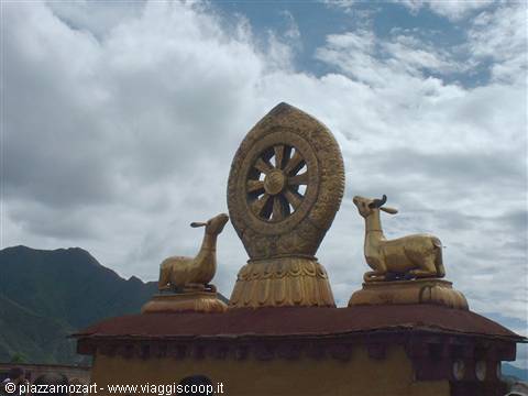 Golden Dharma wheel flanked by two deer on Jokhang temple roof, Lhasa