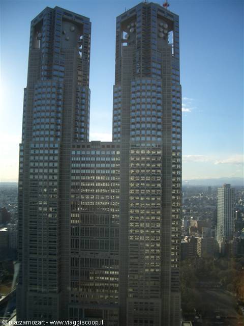 The twin towers of Tokyo's Metropolitan Government Building under the sun