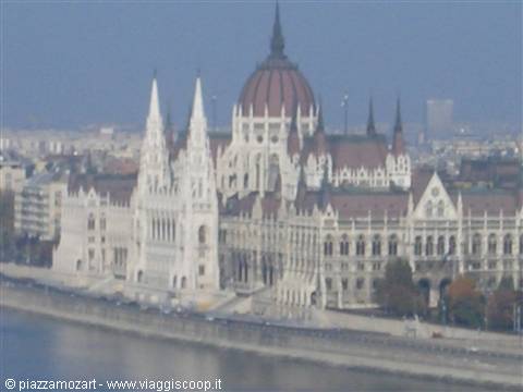 The Hungarian Parliament in Budapest with its red dome overlooking the Danube