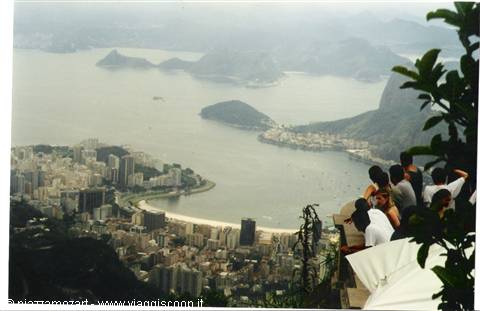Tourists on a viewpoint terrace overlooking Botafogo Bay, Rio de Janeiro