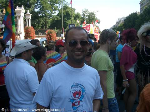 Man in sunglasses and cartoon t-shirt at Madrid Pride parade
