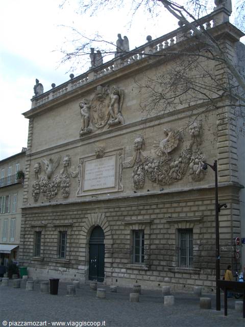 Baroque facade with sculpted reliefs and statues, Hôtel des Monnaies in Avignon