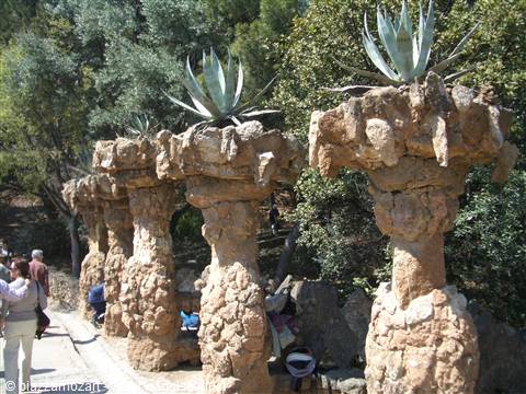 Rough stone columns topped with agaves at Gaudí's Park Güell, Barcelona