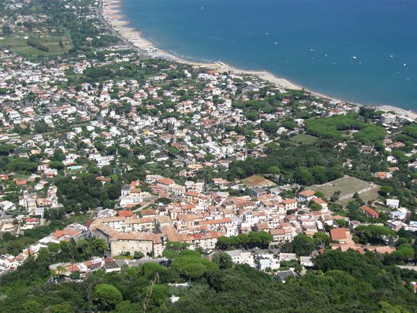 Rooftops and houses of San Felice Circeo overlooking the beach and blue sea