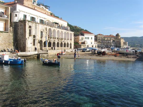 Boats in Ischia Ponte harbor in front of the Aragonese castle