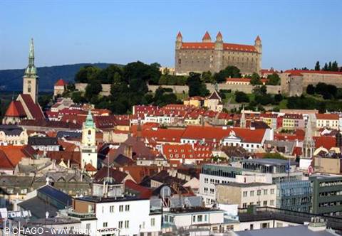 Bratislava Castle overlooks the red rooftops of the old town below