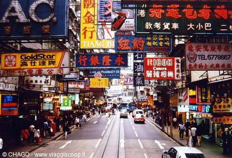 Neon Chinese signs over busy traffic on Nathan Road, Hong Kong