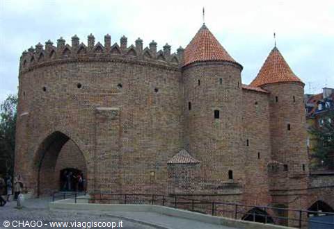 Warsaw Barbakan, medieval red brick fortress with conical towers